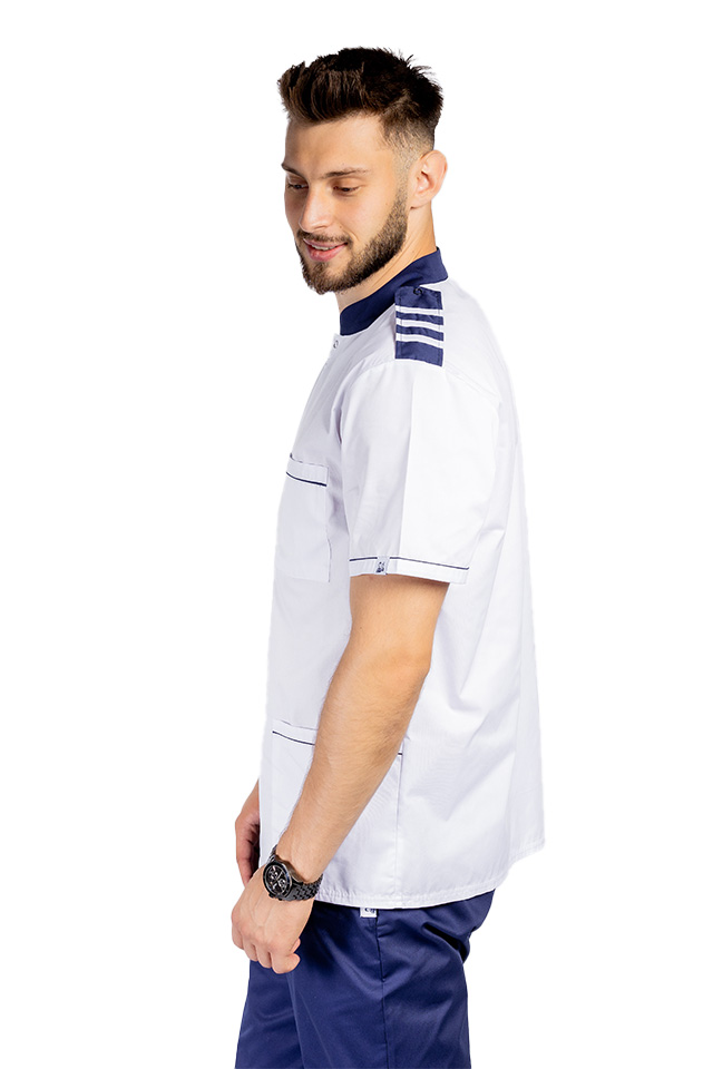 Uniforma bucatar tip tunica, cu bluza alb cu paspol bleumarin, epoleti si pantaloni bleumarin cu elastic